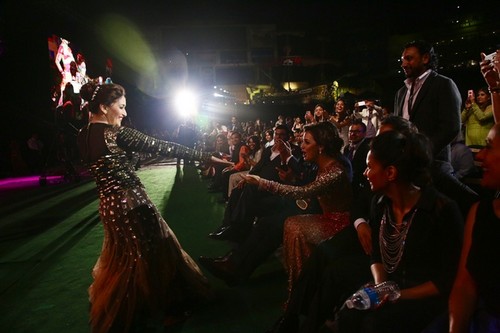 Madhuri gets off the stage to greet fellow celebrities